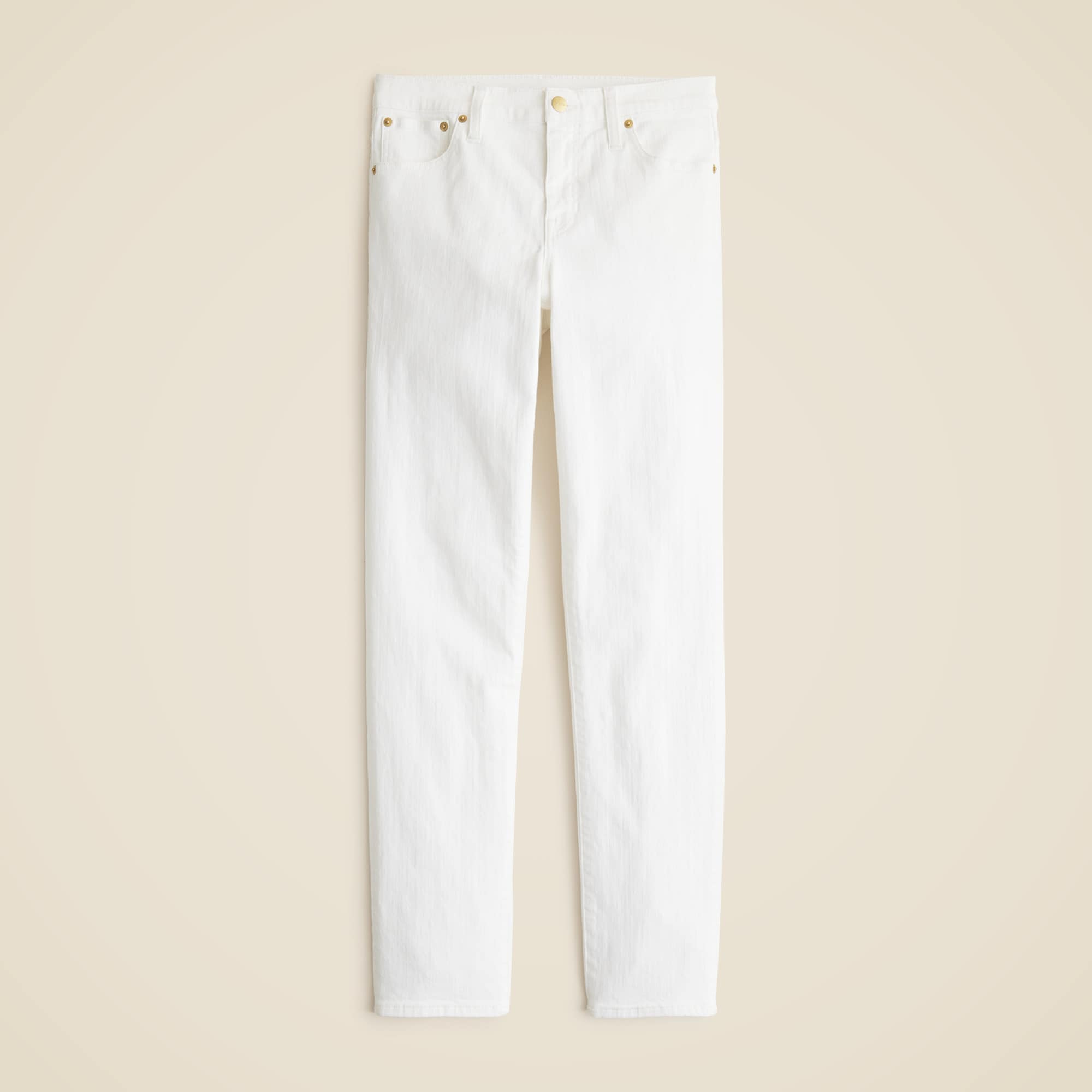 White slim-fit jeans with a mid-rise, five-pocket styling, and a zip fly.