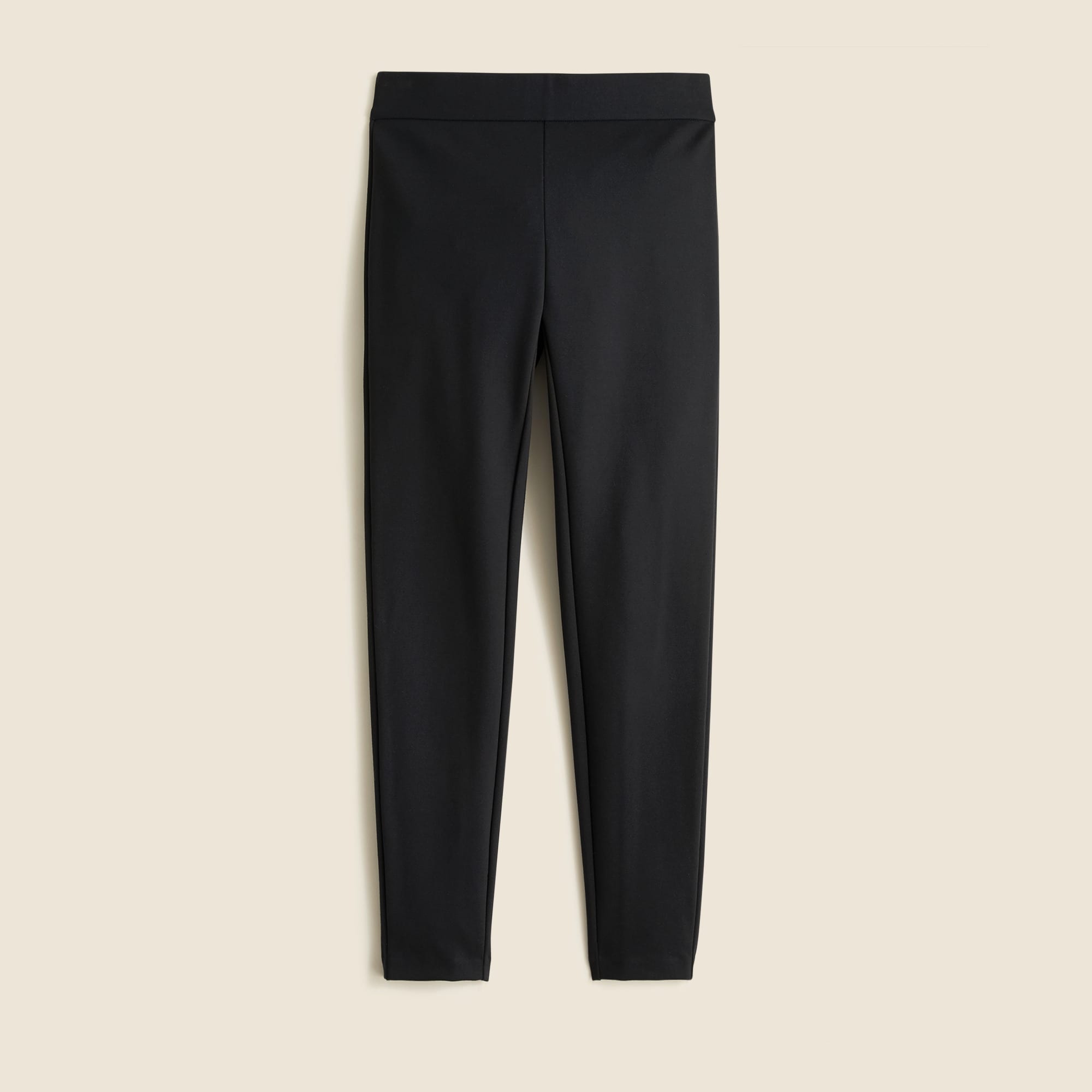 A pair of high-rise black women's pants made from stretch ponte fabric, with a fitted style and a back zipper.