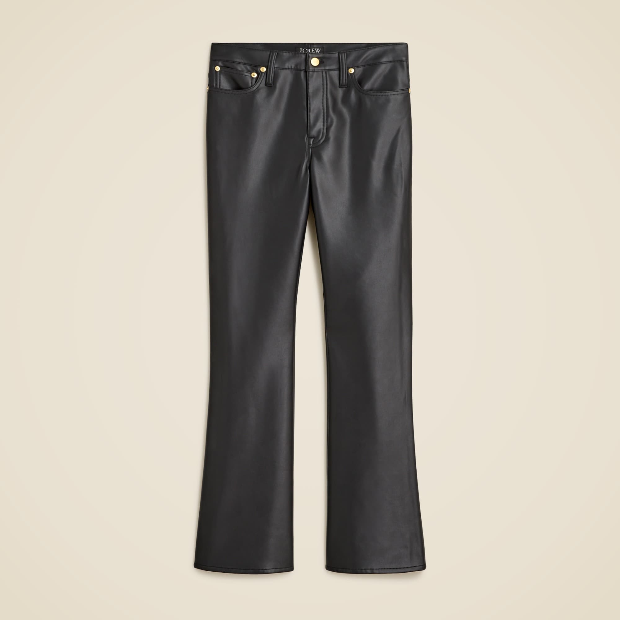 A pair of black high-rise faux leather bootcut pants with a zip fly and pockets, shown flat.