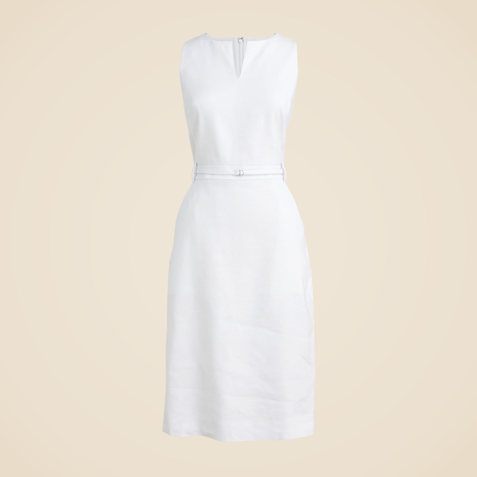 A white sleeveless sheath dress with a fitted waist, back zipper, and a thin belt, displayed against a plain background.