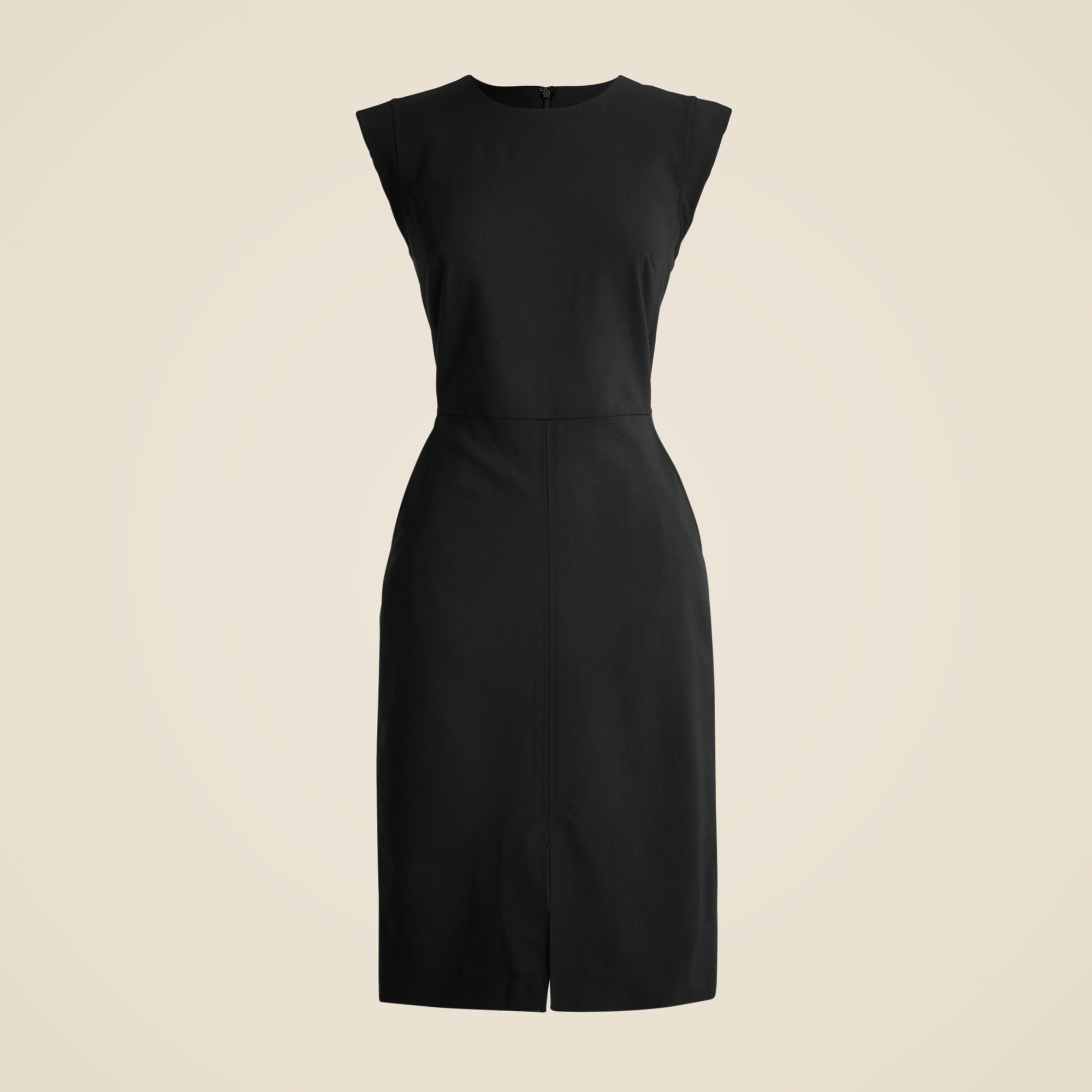 A black sleeveless sheath dress with a front slit, knee-length, made from Italian wool blend fabric, displayed on a plain background.