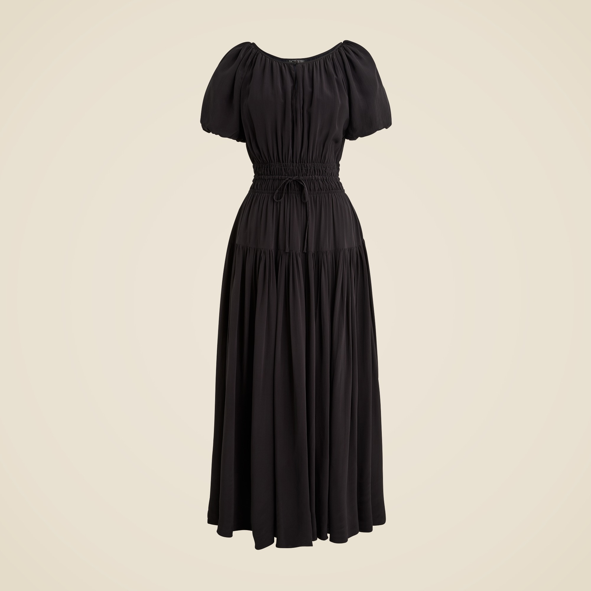 A black women's dress with puff sleeves, high neckline, elastic waist with drawstring, and a long flowing skirt.