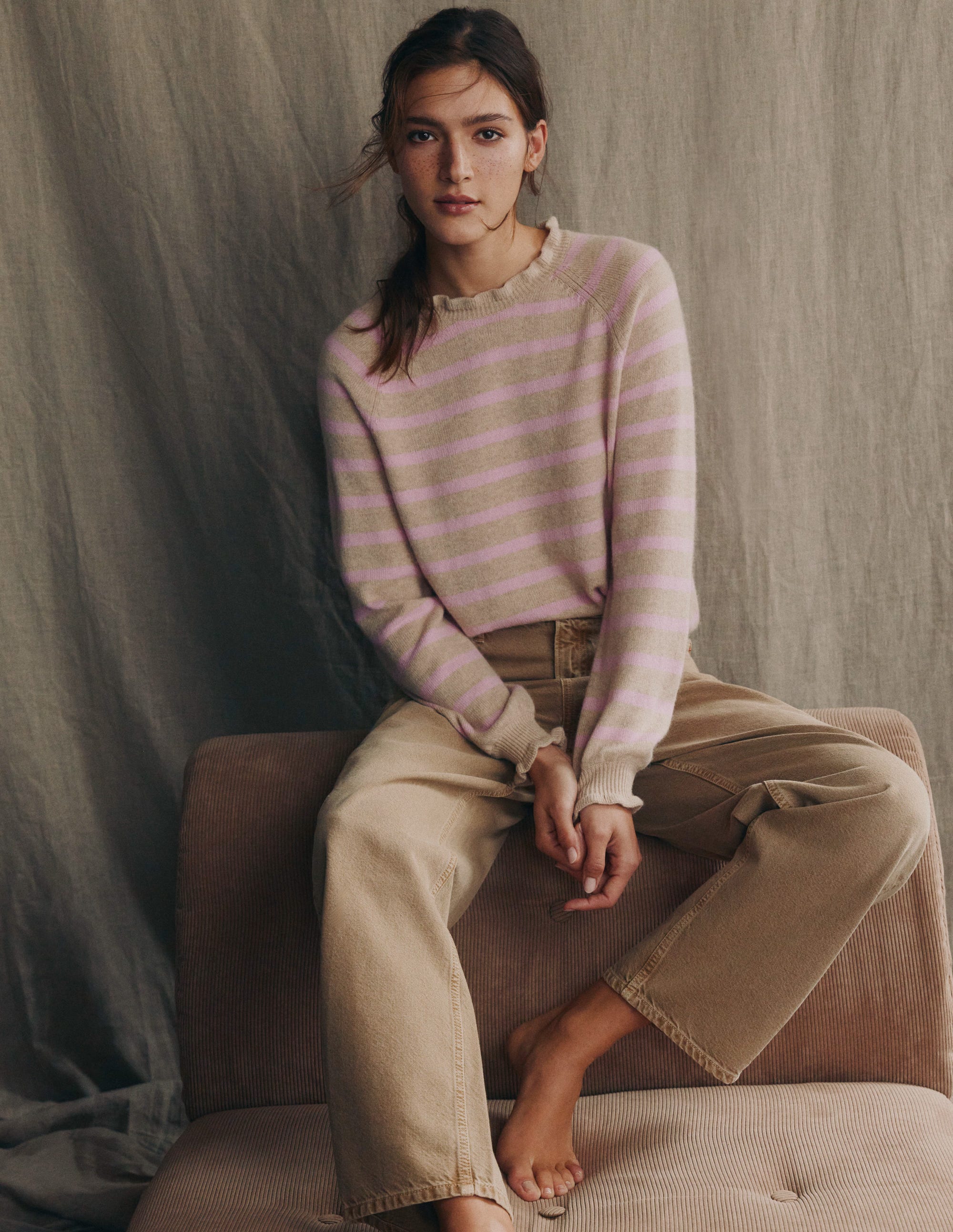 A pair of women's tobacco-colored barrel jeans with a relaxed silhouette, five pockets, and a high waist, shown in the image.